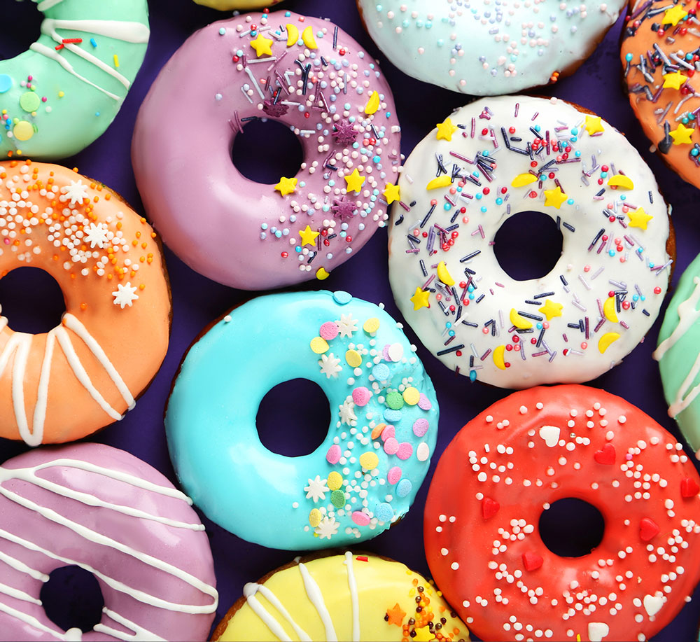 Lots of colourful doughnuts