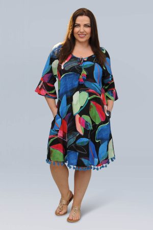 The model in this photo is wearing a glorious, bright, Summer Orientique Seychelles tassle dress in larger sizes at Bakou London