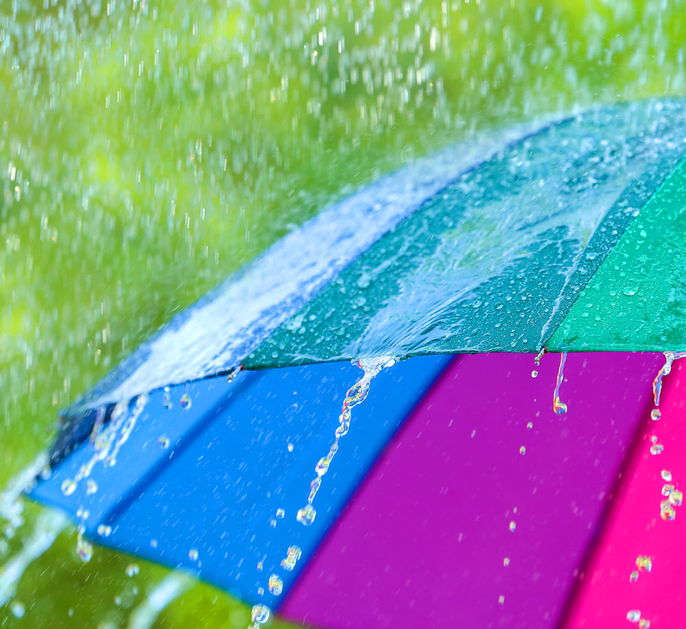 Raind on rainbow umbrella
