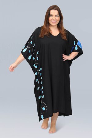 The model in this photo is wearing a glamorous one size flowing kaftan by Angel Circle at Bakou