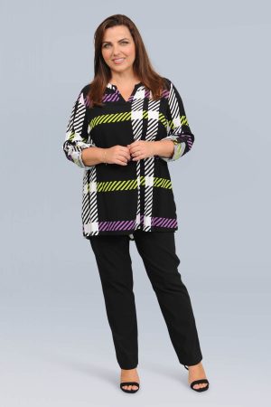 The model in this photo is wearing a soft tunic with an abstract stripe print from plus size specialists Doris Streich at Bakou