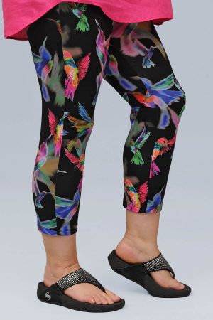 The model in this photo is wearing bright hummingbird leggings from Doris Streich at Bakou