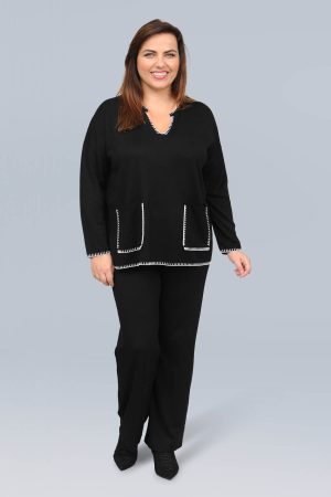 The model in this photo is wearing a gorgeous jumper with funky stitch details by German plus size specialists, Doris Streich from Bakou London