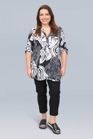 The model in this photo is wearing a soft, viscose v neck kaftan style tunic by plus size experts, Doris Streich, from Bakou London