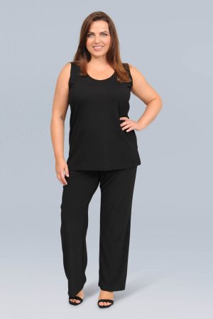 The model in this photo is wearing a wardrobe staple - a jersey A line vest teamed with palazzo pants in plus sizes by Doris Streich at Bakou London