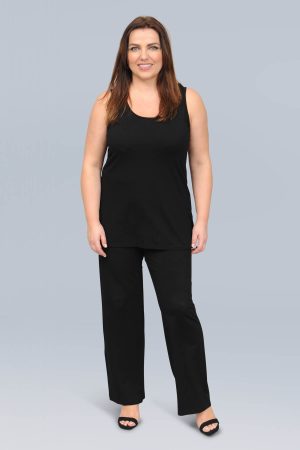 The model in this photo is wearing a wardrobe staple - a jersey A line vest teamed with palazzo pants in plus sizes by Doris Streich at Bakou London