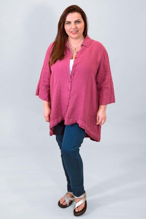 The model in this photo is wearing a Grizas linen shirt in pink orchid with light denim Robell Marie pull on jeans and a Kasbah Tevana 2 white vest