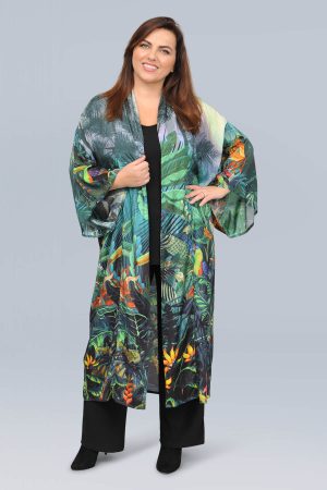 The model in this photo is wearing a long flowing kimono from Orientique in plus sizes at Bakou London