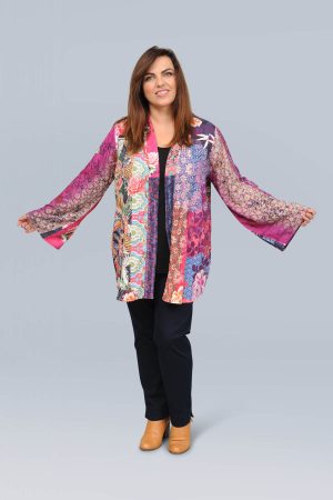 The model in this photo is wearing a luxurious short kimono by Orientique at Bakou London for curvy girls