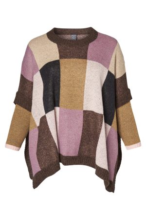 This is an image of a Pont Neuf Salva poncho jumper for warmth on a Winter's day at Bakou London