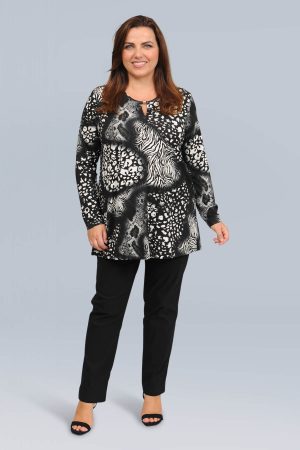 The model in this photo is wearing a gorgeous animal print top by plus size specialists See You at Bakou London