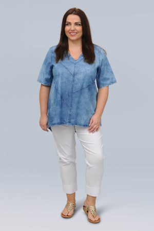 The model in this photo is wearing a fresh and funky mock denim cotton short sleeved top by See You or Biggi M at Bakou London for plus size ladies