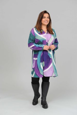 The model in this photo is wearing a long tunic or dress in a fabulous Via Appia abstract design in large sizes at Bakou