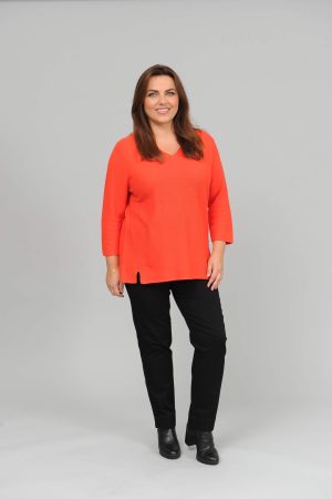 The model in this photo is wearing a gorgeous cotton 3/4 sleeve cotton v neck jumper in plus sizes at Bakou