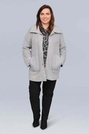 The model in this photo is wearing a lightweight jacket with popper fastenings by Via Appia Due for larger ladies at Bakou.