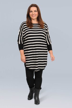 The model in this photo is wearing a black and cream stripe Shanti jumper by Wasabi Concept at Bakou London for plus size ladies